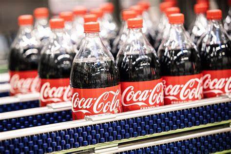 Earnings live: GM stock sinks on tariff hit, Coca-Cola to launch cane sugar soda