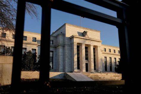 Fed holds rates steady, but slows expected pace of future cuts