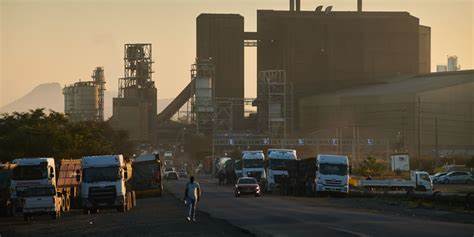 BHP Profit Falls on One-off Charges; Payout Pared as Miner Pursues Growth - WSJ - The Wall Street Journal