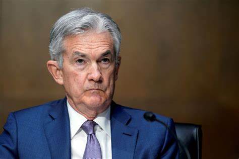 Fed Chair Powell says the US economy is in 'solid shape' with gradual rate cuts coming