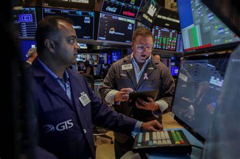 Morning Bid: Tariff imprint spied in US CPI