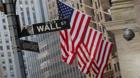 Wall Street ends higher on tech boost, easing tariff tensions