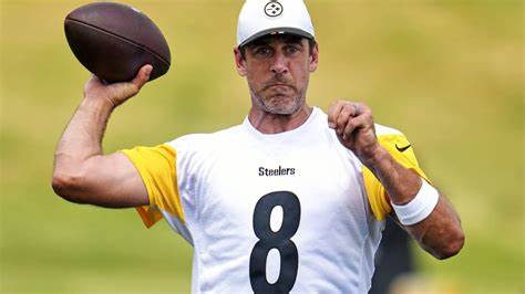 Aaron Rodgers intercepted on first pass of ... - Associated Press News