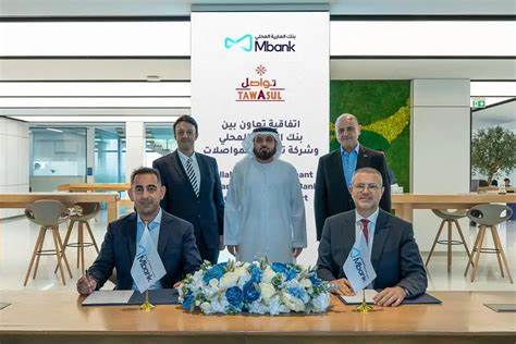 Tawasul Transport and Al Maryah Community Bank launch the first digital payment system in taxis using AE Coin