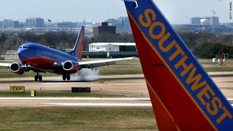 Bullet strikes Southwest Airlines plane as it prepares to depart from Dallas airport - Yahoo