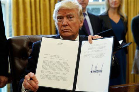 Trump Signed 26 Executive Orders on Day 1: Here’s How 2 Could Impact the Middle Class - Yahoo Finance