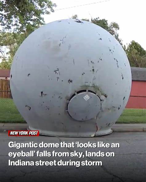Gigantic dome that looks like an eyeball falls from sky on street during storm