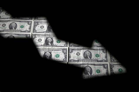 Dollar set for first monthly drop after US inflation readout - Reuters