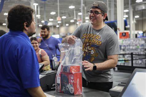 Retail sales show US consumer spending holds up, but 'almost everyone' is looking for deals