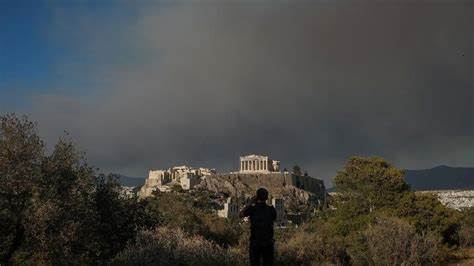 Greece battles wildfires, evacuating residents near Athens - BBC